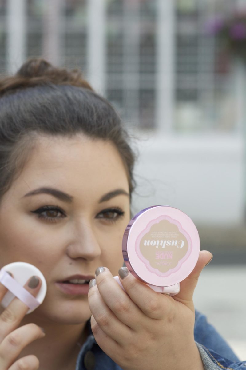 Applying L'Oreal Nude Magique Cushion Foundation